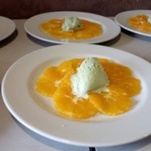 Carpaccio* d’orange à l’huile d’olive* et sorbet au genépi